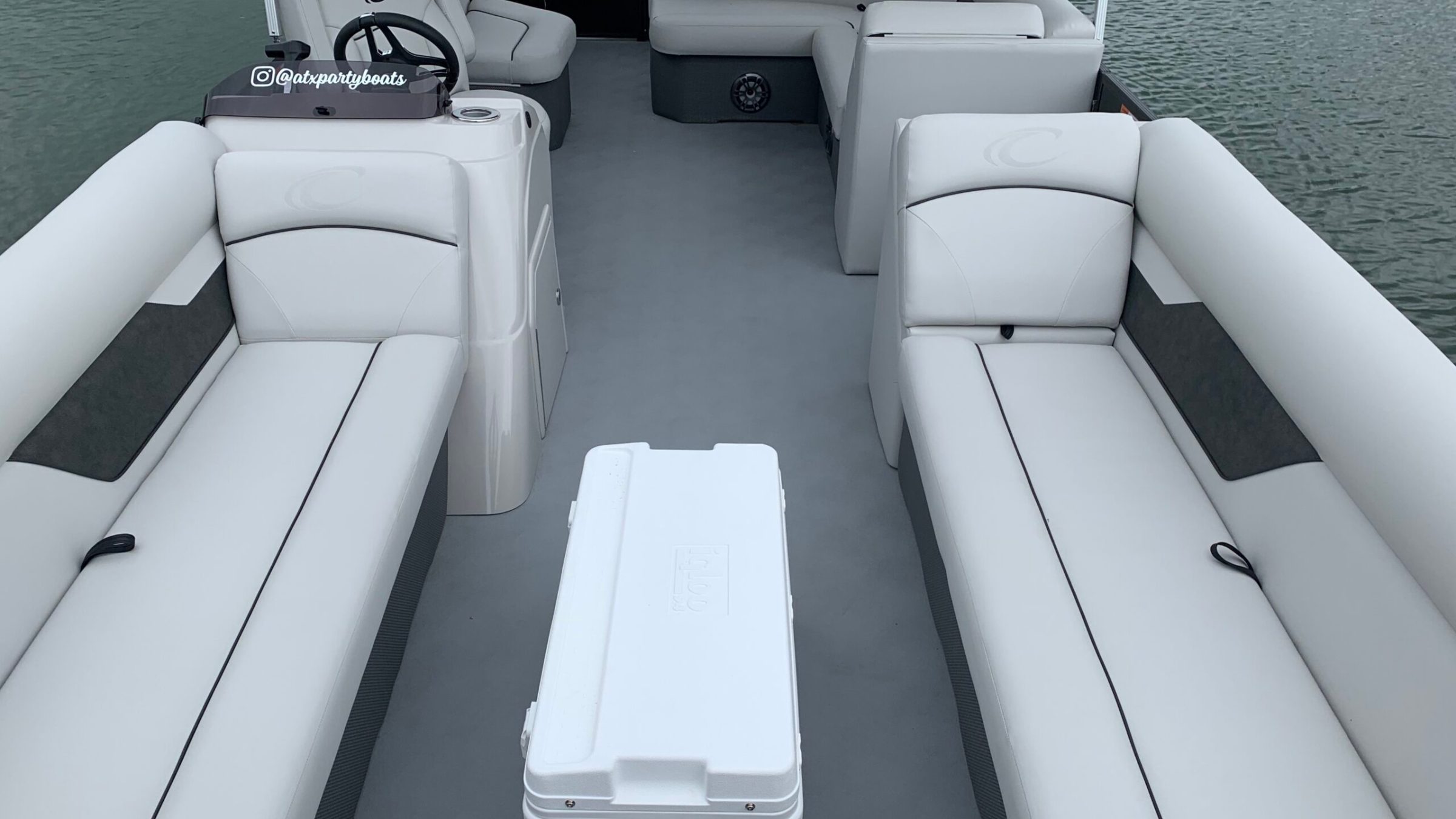 a boat sitting on top of a car