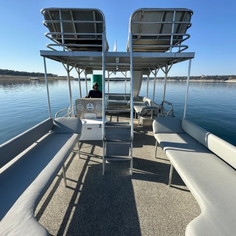a boat is docked next to a body of water