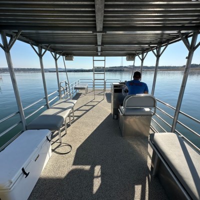 a boat is docked next to a body of water