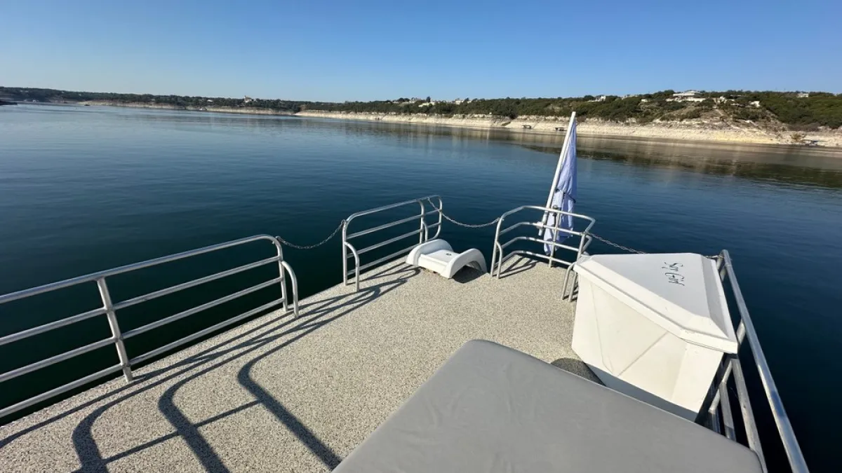 a bench next to a body of water