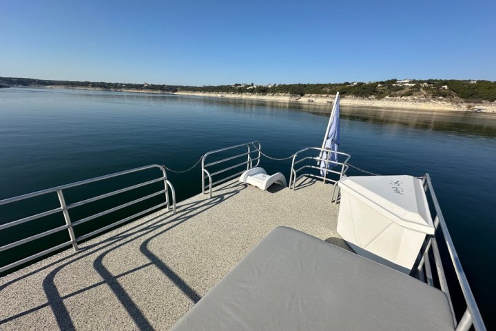 a bench next to a body of water