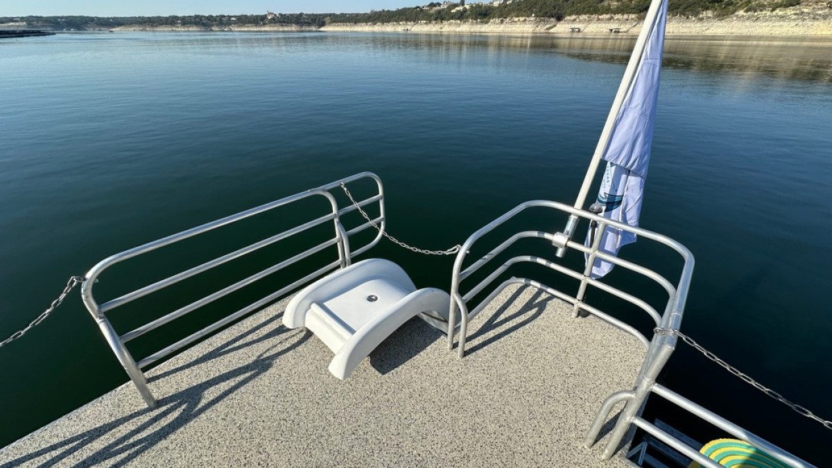 a bench in front of a body of water