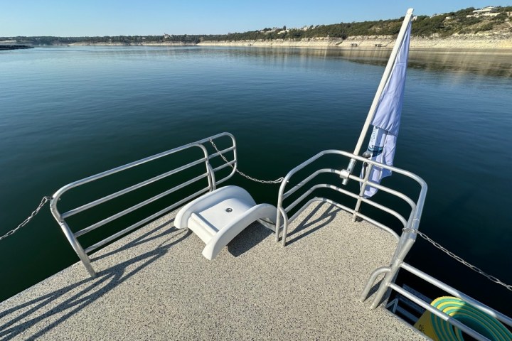 a bench in front of a body of water