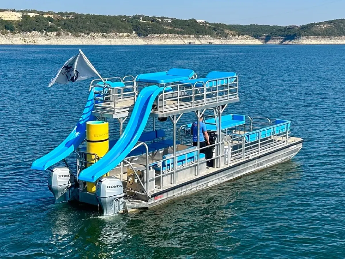 a blue boat on a body of water