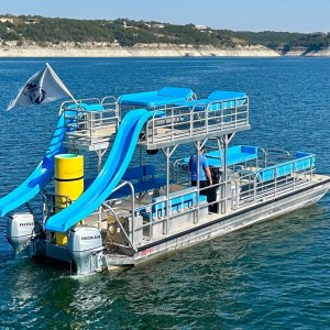 a blue boat on a body of water