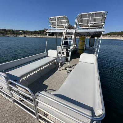 a boat is docked next to a body of water