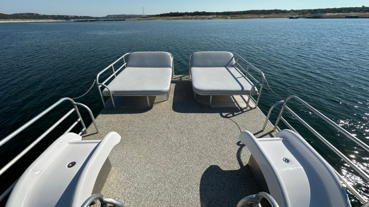 a boat parked next to a body of water