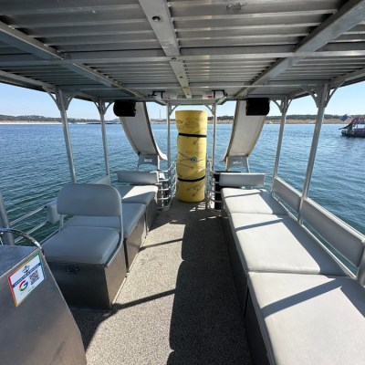 a boat is docked next to a body of water