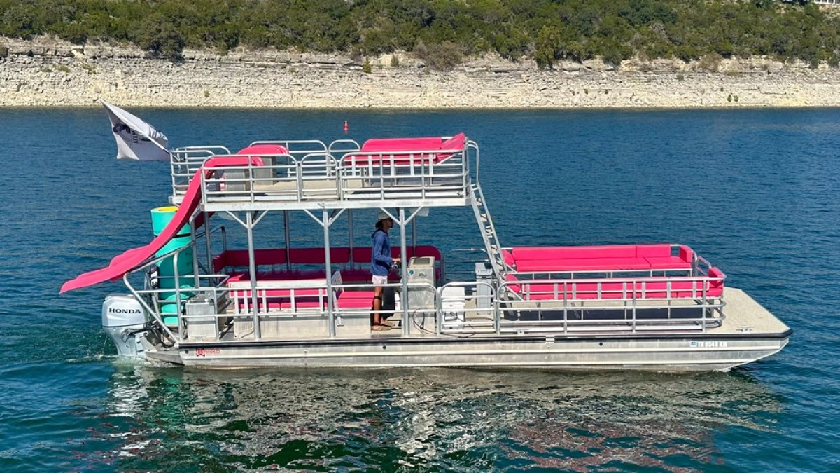 a small boat in a large body of water