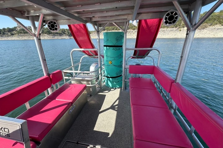 a boat is docked next to a body of water