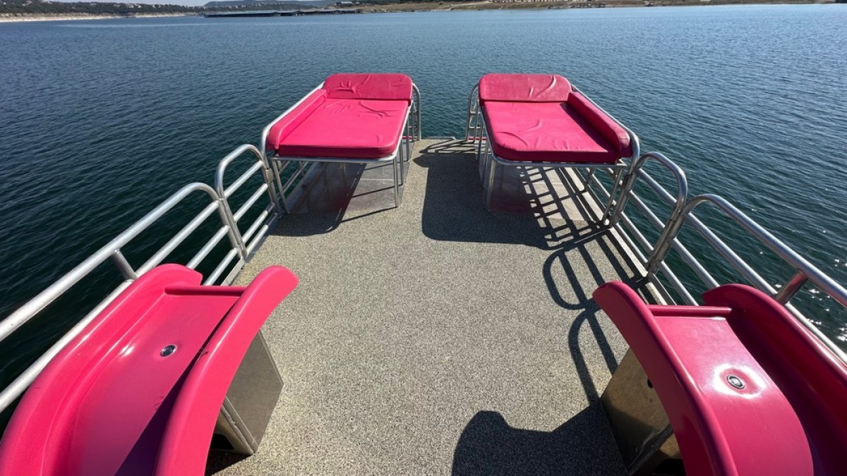 a boat parked next to a body of water