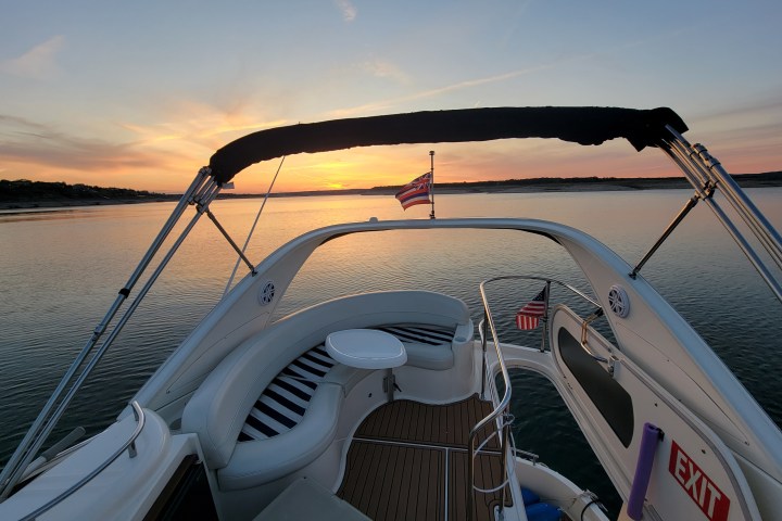 a boat parked next to a body of water