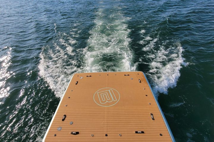 a boat sitting on top of a body of water