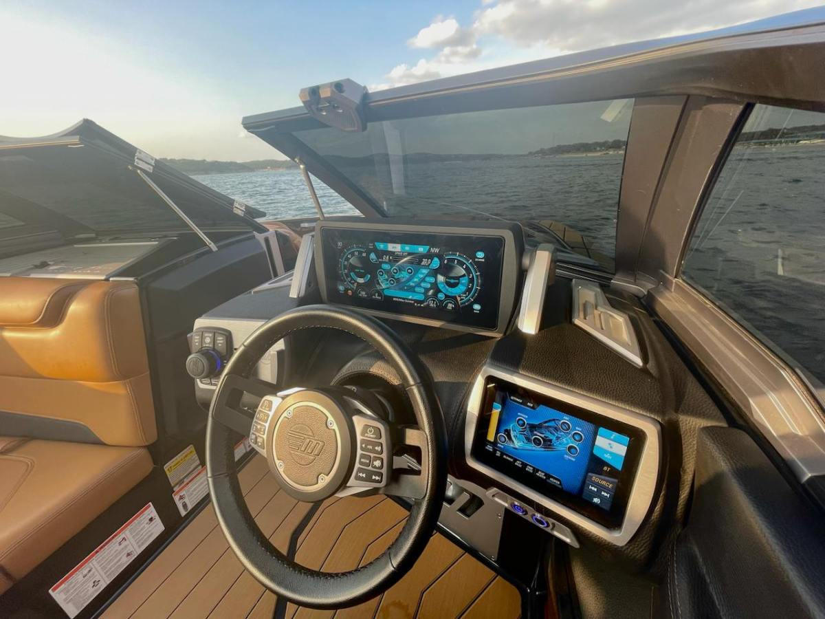 a boat sitting on top of a car