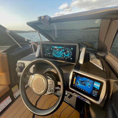 a boat sitting on top of a car