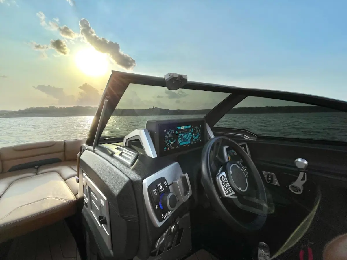 a boat sitting on top of a car