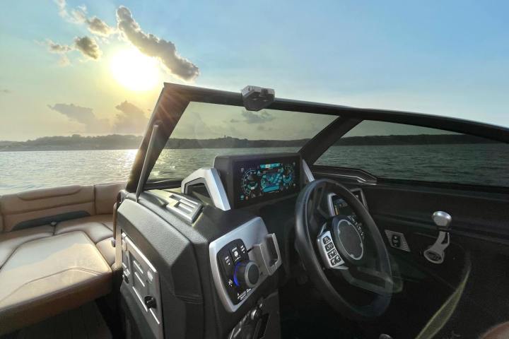 a boat sitting on top of a car